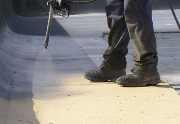 Coating systems over West Valley spray foam roof systems